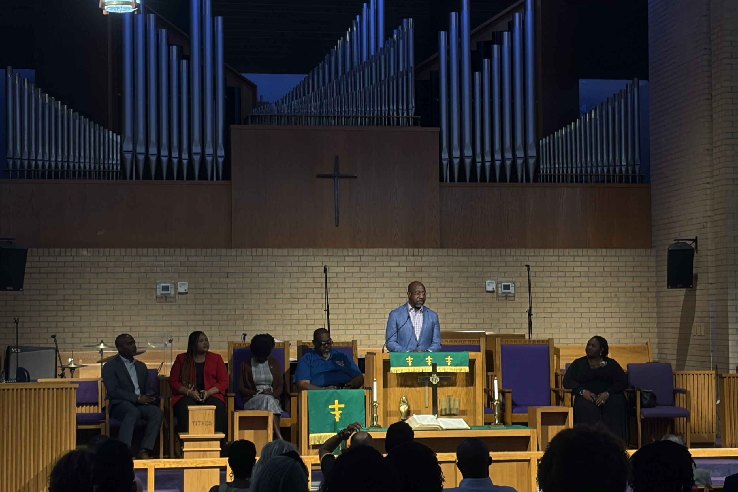 Sen. Raphael Warnock addresses a gathering of faith leaders at St. Joseph’s AME Church in Durham, N.C..